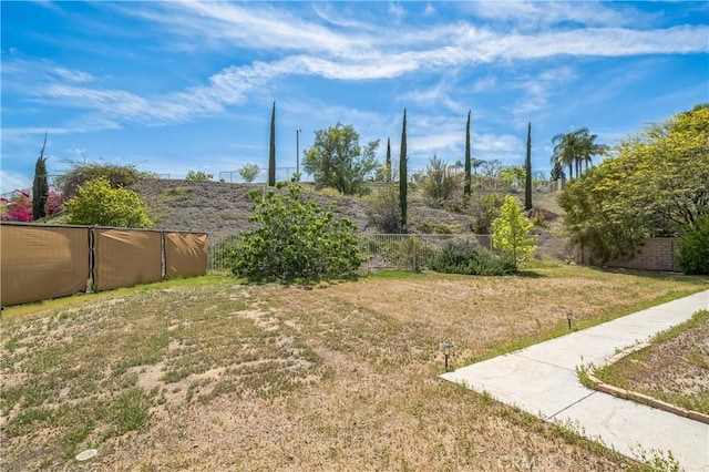 view of yard featuring fence