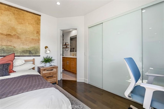 5545 Whitsett Ave Unit 1, Valley Village, CA 91607 - bedroom with dark wood-type flooring, a closet, and recessed lighting