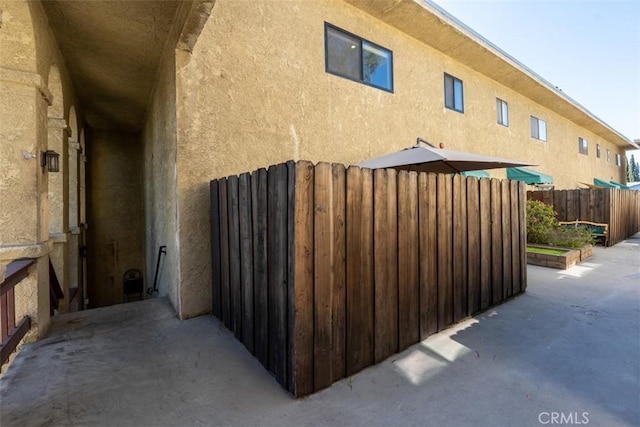 5545 Whitsett Ave Unit 1, Valley Village, CA 91607 - view of home's exterior with stucco siding and fence