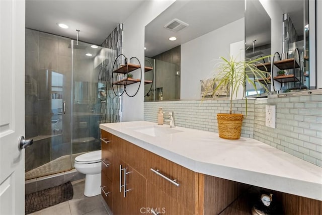 5545 Whitsett Ave Unit 1, Valley Village, CA 91607 - full bath featuring vanity, tile patterned flooring, visible vents, toilet, and a stall shower