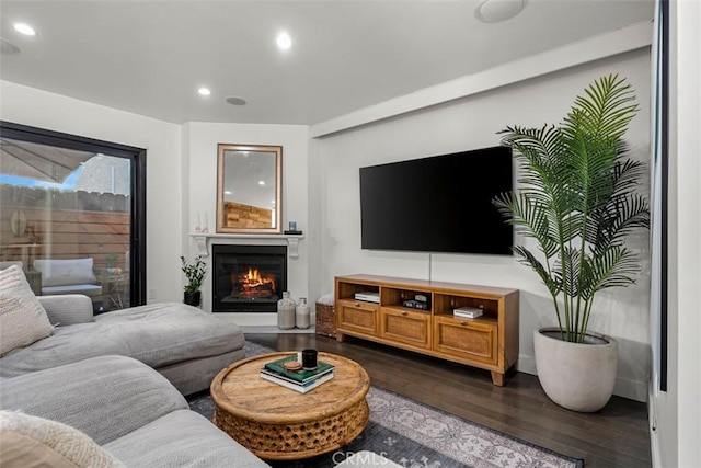5545 Whitsett Ave Unit 1, Valley Village, CA 91607 - living area featuring a warm lit fireplace, recessed lighting, and wood finished floors