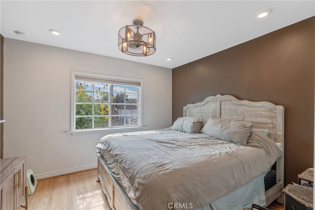 14844 Lull St, Van Nuys, CA 91405 - bedroom featuring light wood-type flooring, baseboards, and recessed lighting