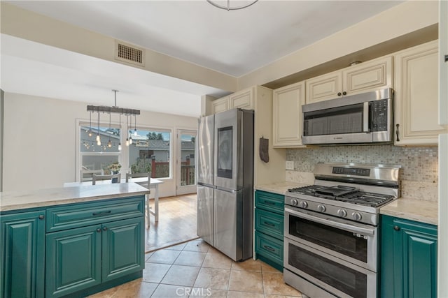 14844 Lull St, Van Nuys, CA 91405 - kitchen with pendant lighting, tasteful backsplash, visible vents, a chandelier, and stainless steel appliances