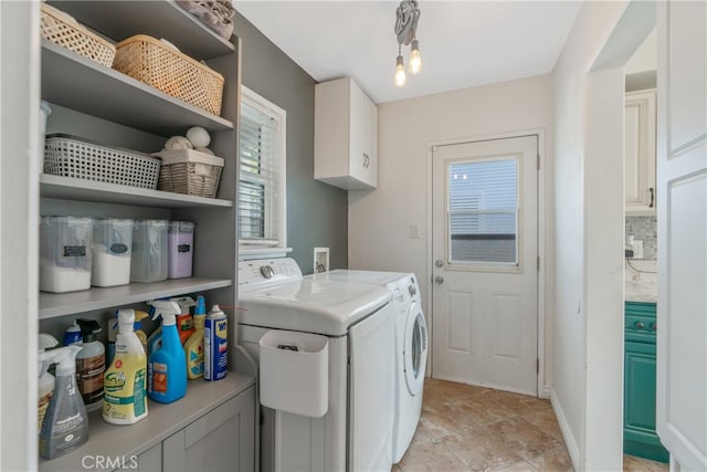 14844 Lull St, Van Nuys, CA 91405 - clothes washing area with baseboards, cabinet space, and washing machine and dryer