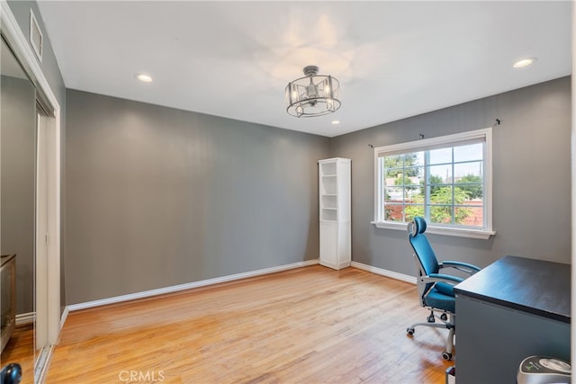 14844 Lull St, Van Nuys, CA 91405 - office area featuring wood finished floors, a chandelier, and recessed lighting