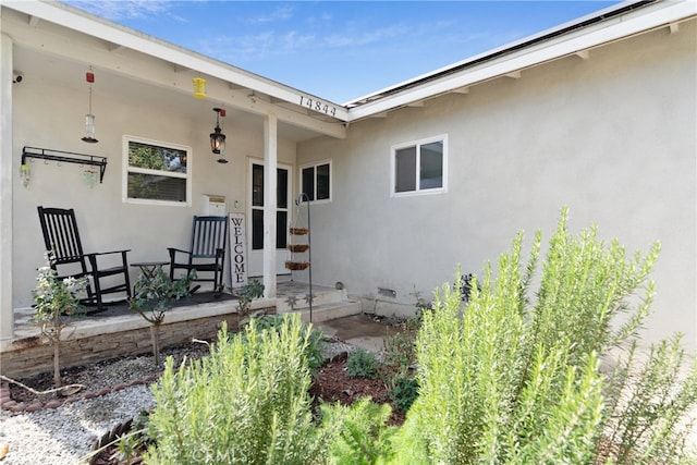 14844 Lull St, Van Nuys, CA 91405 - doorway to property with a porch and stucco siding