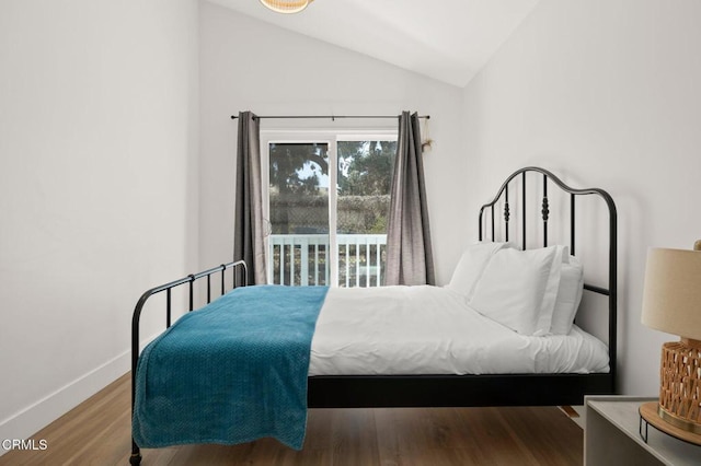 288 Highland Dr, Oxnard, CA 93035 - bedroom with access to exterior, baseboards, wood finished floors, and lofted ceiling