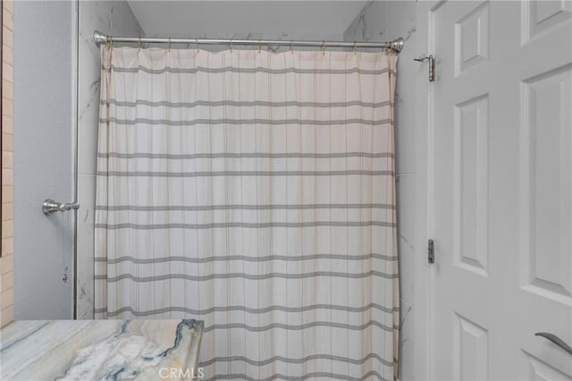 9876 Arrow Unit 1, Rancho Cucamonga, CA 91730 - full bathroom with a shower with shower curtain