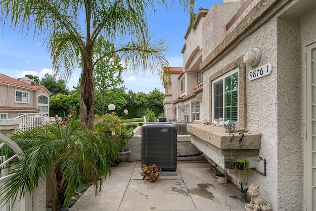 9876 Arrow Unit 1, Rancho Cucamonga, CA 91730 - view of patio featuring central AC unit