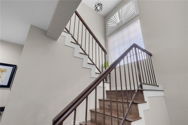 9876 Arrow Unit 1, Rancho Cucamonga, CA 91730 - staircase with a textured wall