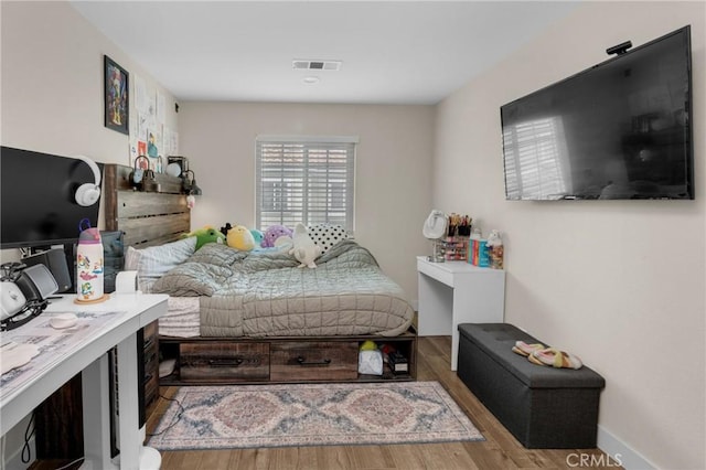 9876 Arrow Unit 1, Rancho Cucamonga, CA 91730 - bedroom with wood finished floors