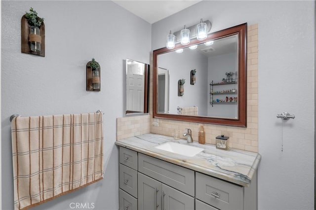 9876 Arrow Unit 1, Rancho Cucamonga, CA 91730 - bathroom featuring backsplash and vanity