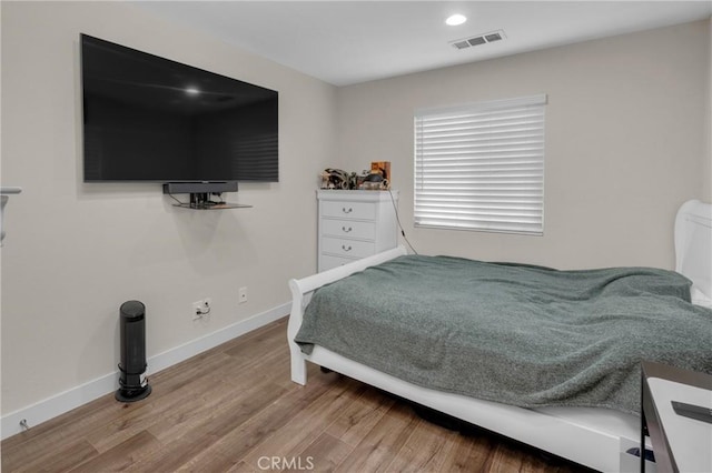 9876 Arrow Unit 1, Rancho Cucamonga, CA 91730 - bedroom with wood finished floors, baseboards, and recessed lighting