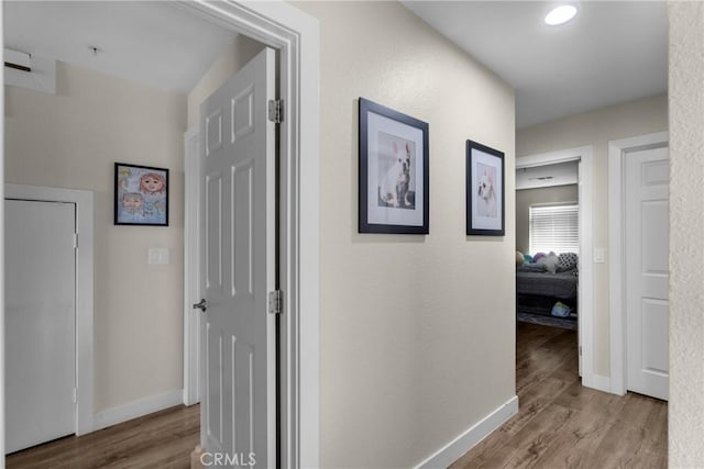 9876 Arrow Unit 1, Rancho Cucamonga, CA 91730 - hallway featuring wood finished floors and baseboards