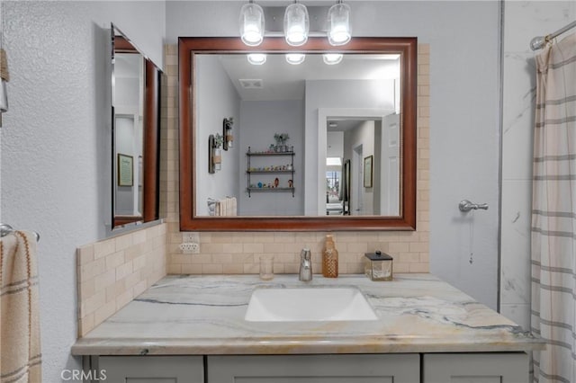 9876 Arrow Unit 1, Rancho Cucamonga, CA 91730 - full bath with vanity, tasteful backsplash, and a shower with shower curtain