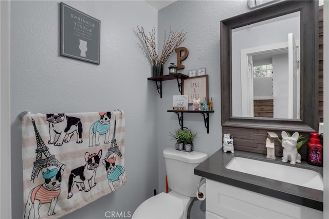 9876 Arrow Unit 1, Rancho Cucamonga, CA 91730 - bathroom featuring toilet and vanity