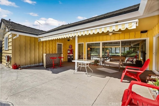 view of patio featuring outdoor dining area