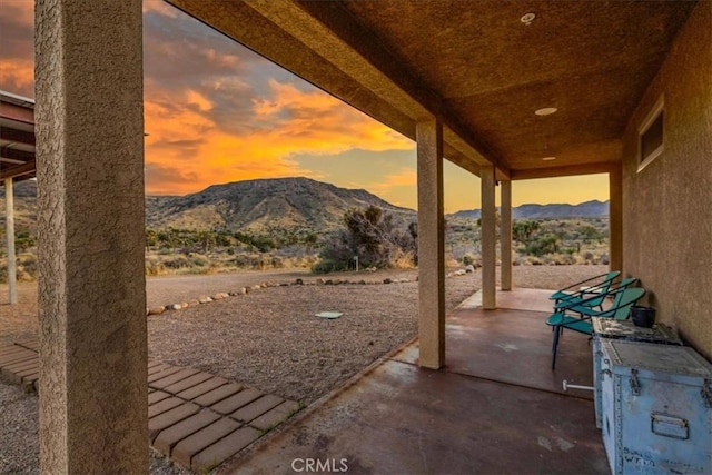 53105 Chia Trl, Pioneertown, CA 92268 - patio terrace at dusk with a mountain view