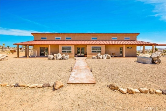 53105 Chia Trl, Pioneertown, CA 92268 - back of house featuring a patio and stucco siding