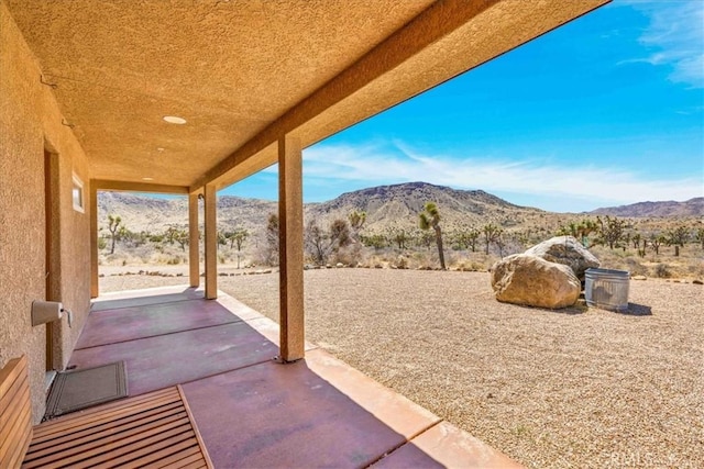 53105 Chia Trl, Pioneertown, CA 92268 - view of patio / terrace featuring a mountain view
