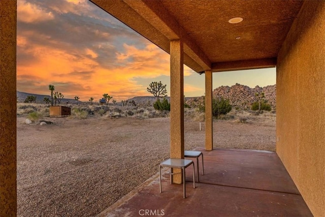 53105 Chia Trl, Pioneertown, CA 92268 - patio terrace at dusk with a mountain view