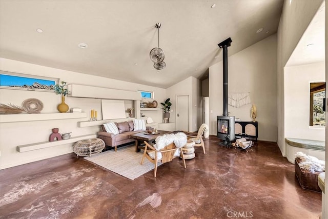 53105 Chia Trl, Pioneertown, CA 92268 - living area with a wood stove, finished concrete floors, and vaulted ceiling