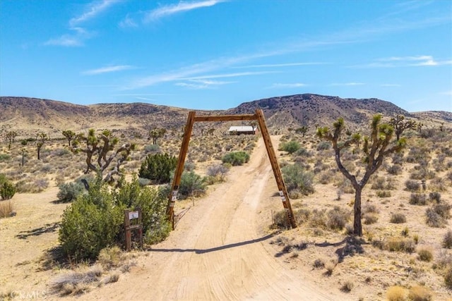 53105 Chia Trl, Pioneertown, CA 92268 - property view of mountains featuring a rural view and a desert view
