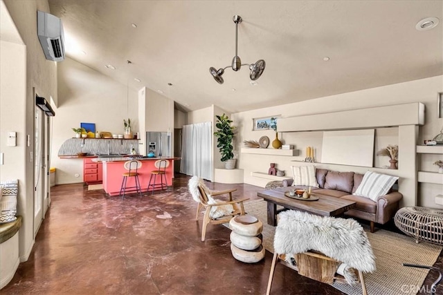 53105 Chia Trl, Pioneertown, CA 92268 - living room with a wall unit AC, high vaulted ceiling, and concrete floors
