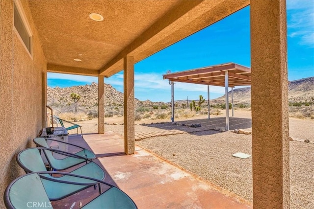 53105 Chia Trl, Pioneertown, CA 92268 - view of patio / terrace featuring a mountain view