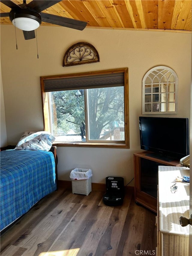 bedroom featuring wooden ceiling, a ceiling fan, and wood finished floors