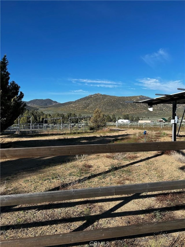 view of mountain feature featuring a rural view