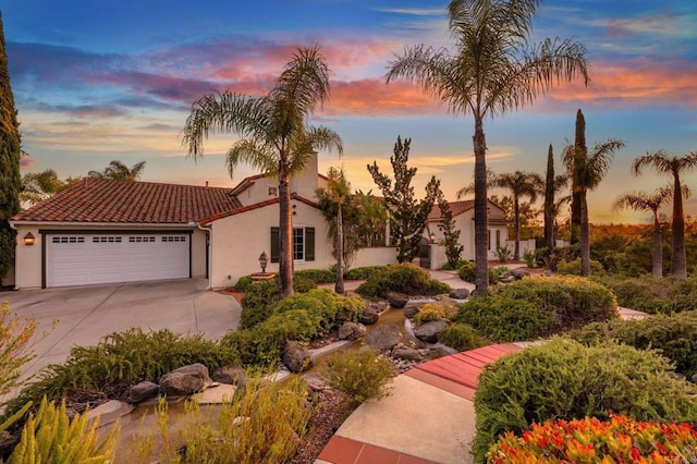 4033 Keri Way, Fallbrook, CA 92028 - mediterranean / spanish home featuring driveway, an attached garage, a tile roof, and stucco siding