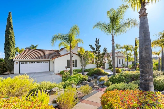 4033 Keri Way, Fallbrook, CA 92028 - view of front of house with a tile roof, stucco siding, an attached garage, and concrete driveway
