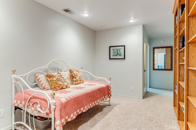bedroom with carpet flooring, baseboards, and visible vents