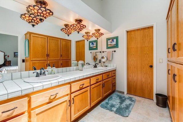 bathroom featuring double vanity and a sink