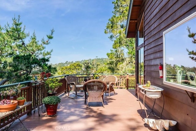 view of wooden balcony with a deck