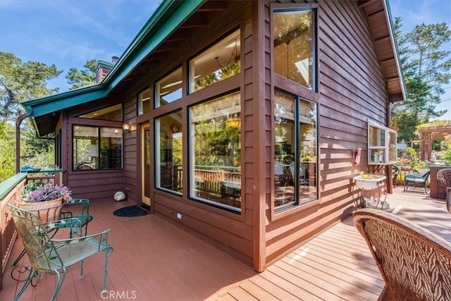 view of home's exterior with a deck