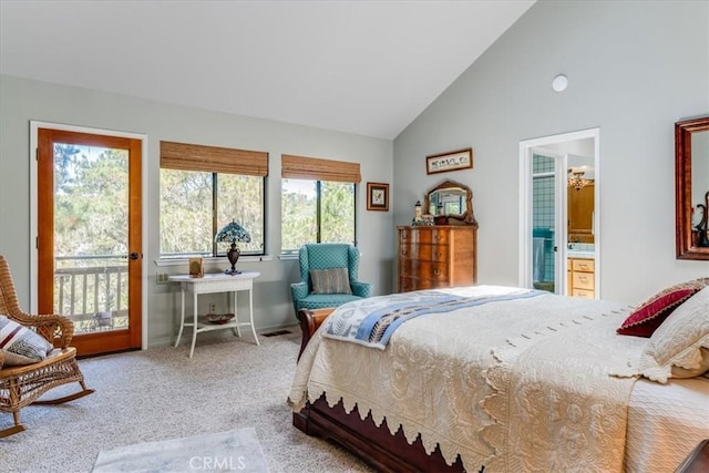 bedroom with ensuite bath, baseboards, high vaulted ceiling, and carpet
