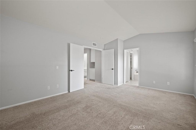 41564 Big Sage Ct, Temecula, CA 92591 - empty room with lofted ceiling, light colored carpet, and baseboards