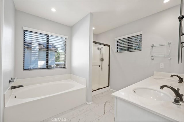 41564 Big Sage Ct, Temecula, CA 92591 - full bathroom with marble look tiles, a bath, a shower stall, recessed lighting, and double vanity