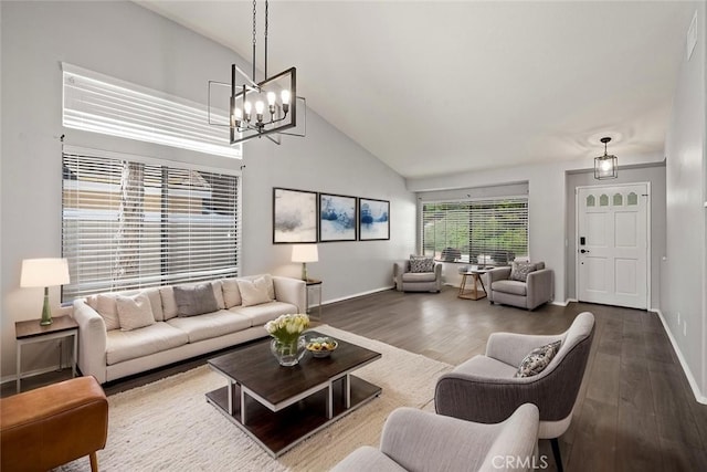 41564 Big Sage Ct, Temecula, CA 92591 - living room featuring high vaulted ceiling, wood finished floors, baseboards, and a chandelier