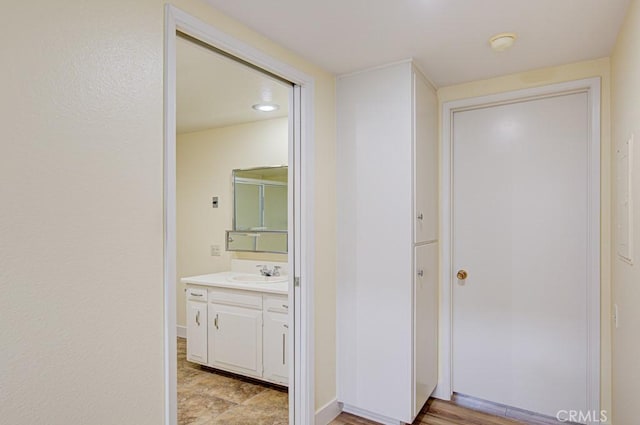 523 Calle Aragon Unit C, Laguna Woods, CA 92637 - hallway with a sink