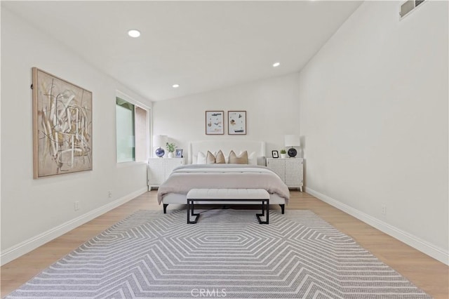 49 W Yale Loop Unit 26, Irvine, CA 92604 - bedroom featuring light wood-style flooring, lofted ceiling, recessed lighting, and baseboards