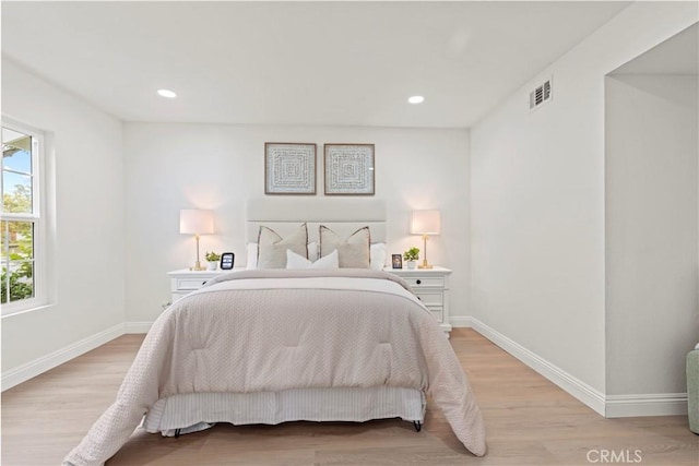 49 W Yale Loop Unit 26, Irvine, CA 92604 - bedroom with light wood finished floors, baseboards, and recessed lighting