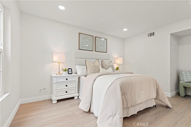 49 W Yale Loop Unit 26, Irvine, CA 92604 - bedroom with light wood finished floors, baseboards, and recessed lighting