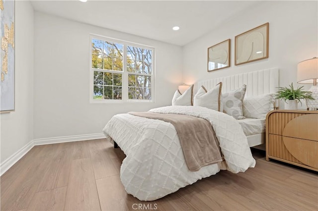 49 W Yale Loop Unit 26, Irvine, CA 92604 - bedroom with wood finished floors, baseboards, and recessed lighting