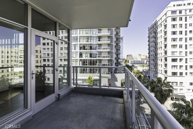 balcony featuring a view of city