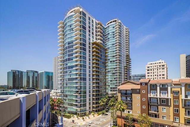 view of property with a city view