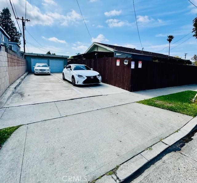 8172 Michael Dr Unit A & B, Huntington Beach, CA 92647 - exterior space with fence and a garage