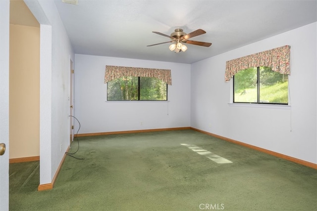 50566 Critter Creek Ln, Oakhurst, CA 93644 - carpeted spare room featuring baseboards and a ceiling fan